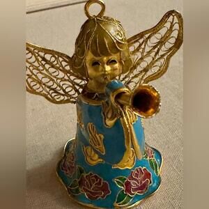 Vintage hand painted and glazed ceramic angel with trumpet 3d details